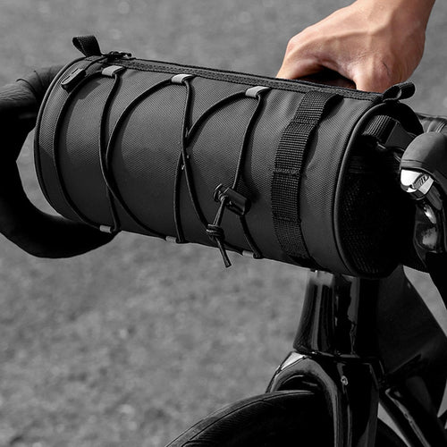 Sacoche guidon de vélo CycloPack cylindrique noire fixée sur cintre de VTT, vue de face